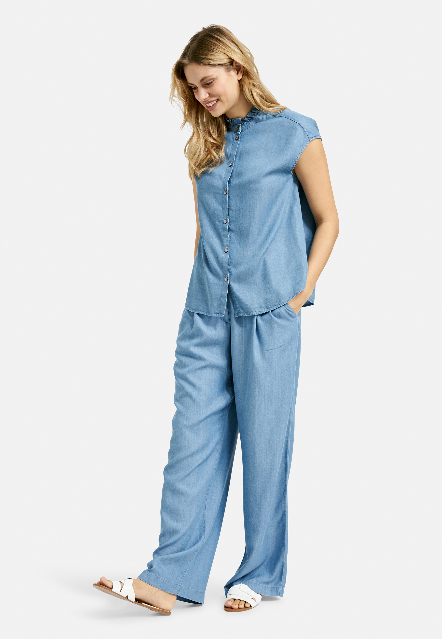 sleeveless blouse with ruffles